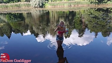 Girl in glasses blowing bubbles on the river. Full clip in Fan Club