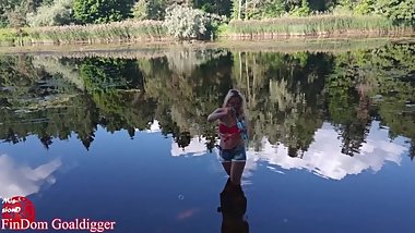 Girl in glasses blowing bubbles on the river. Full clip in Fan Club