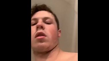 Cute English guy playing with soft dick in the shower