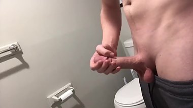Stroking my cock in the bathroom